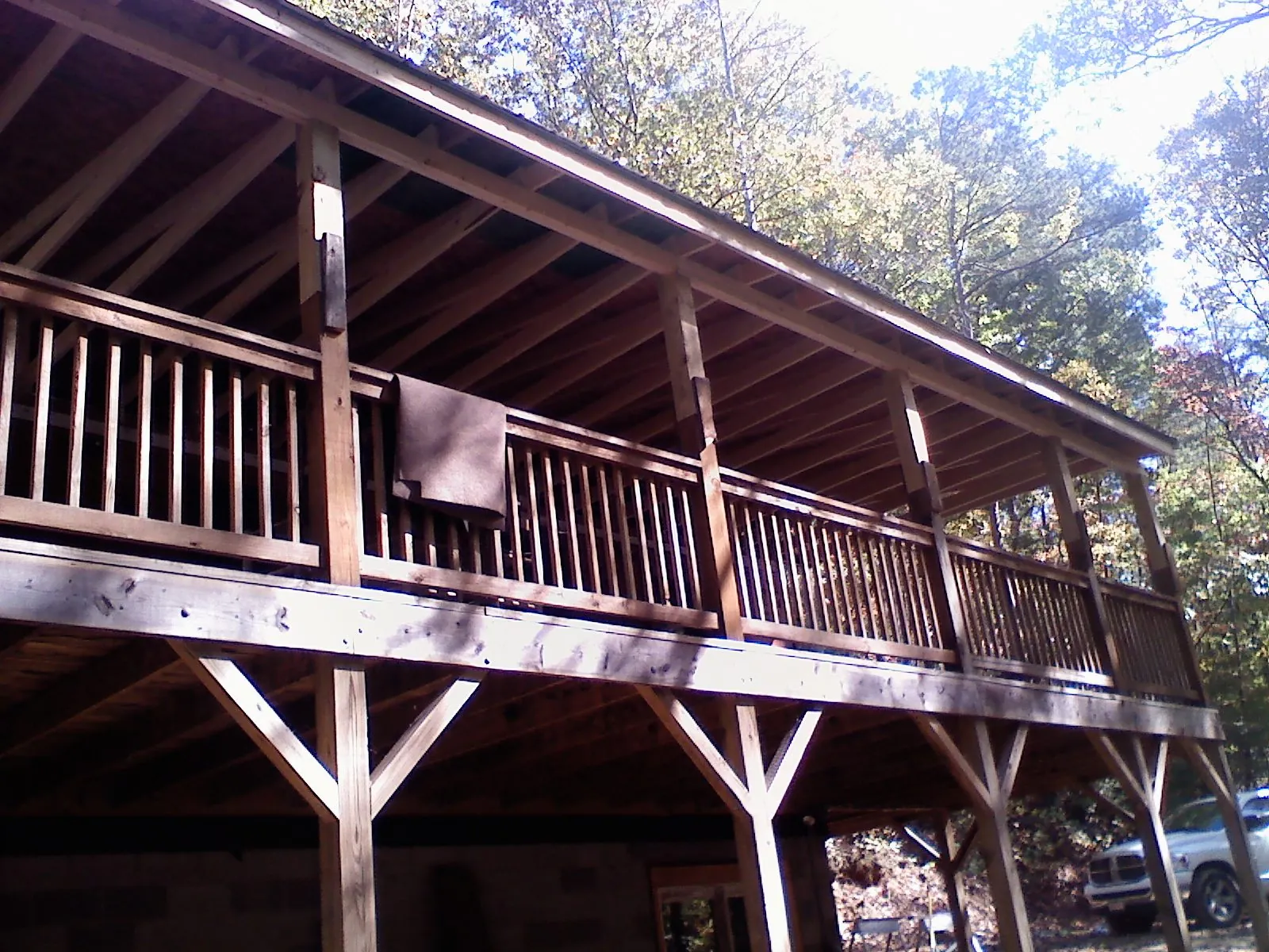 Timber framing under a new elevated porch and deck — Roof Leak Repair in Seal Beach by Roofing Brothers